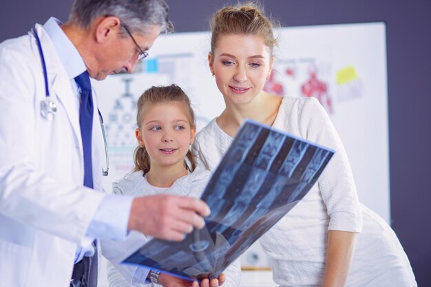 little girl with her mother at a doctor on consultation