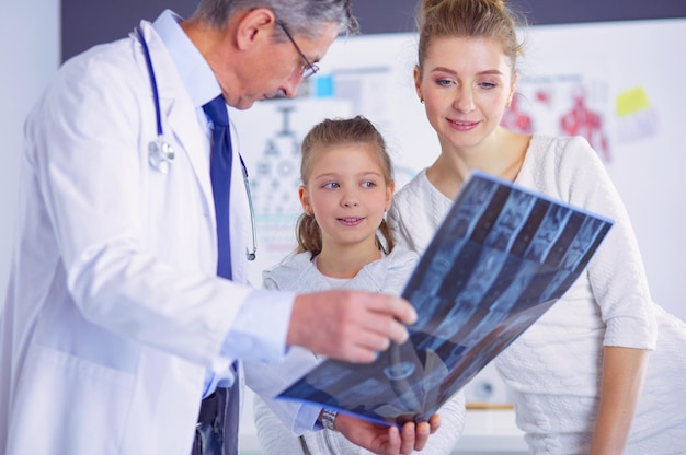 little girl with her mother at a doctor on consultation