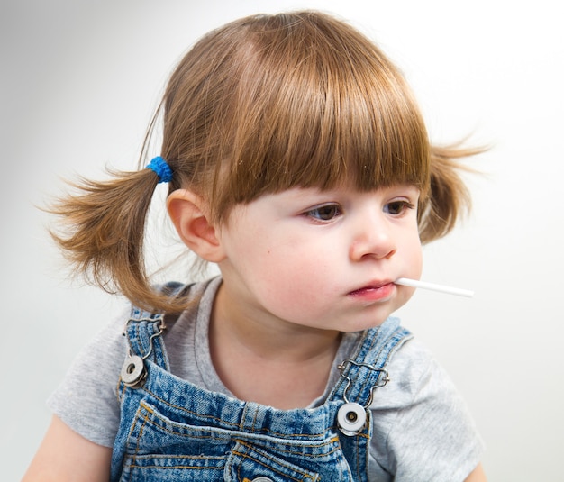 LIttle girl with lollipop