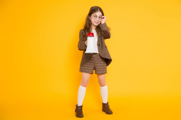 Little girl with loudspeaker