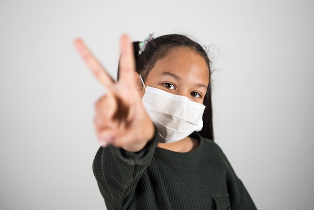 Little girl with medical mask