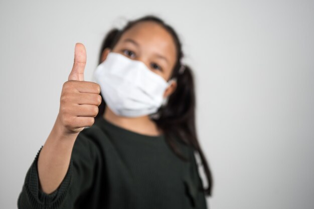 Little girl with medical mask