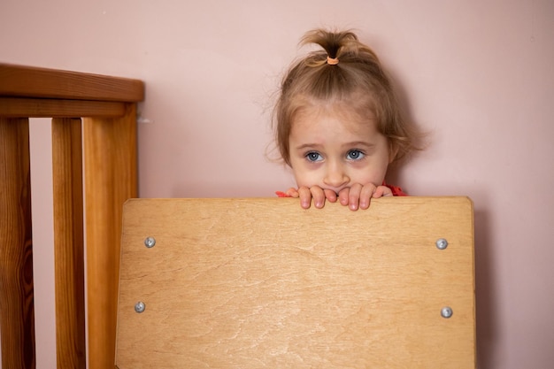 Little girl with a toy in her hands