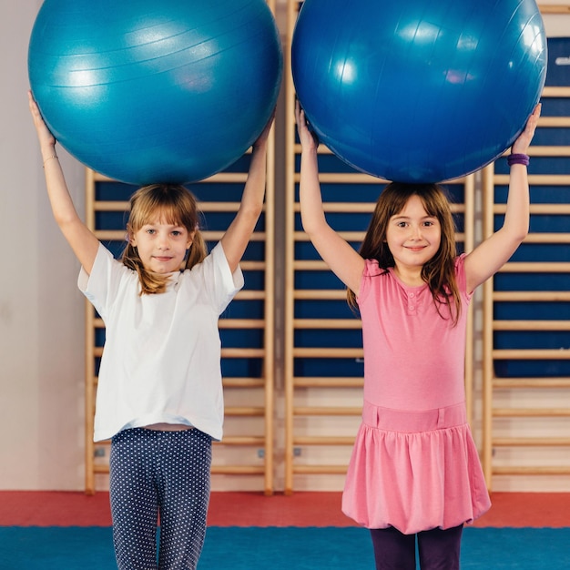 Little girls at physical education class