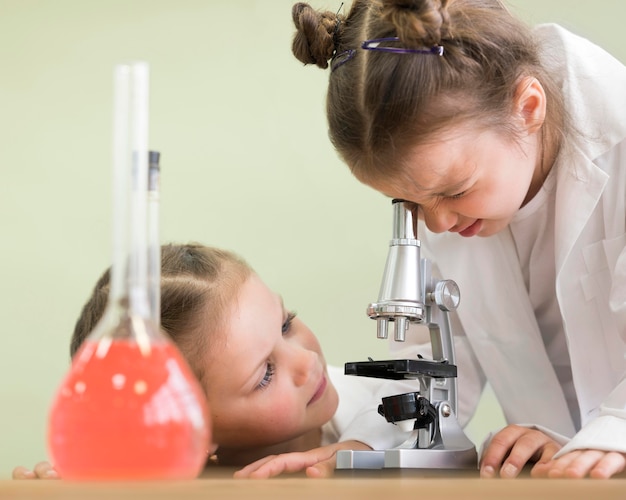 Little girls in science lab