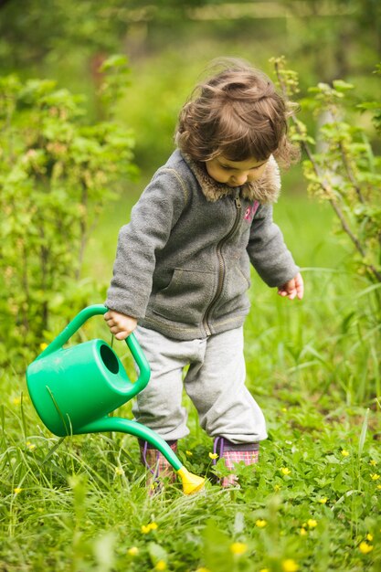 Little kid in the garden