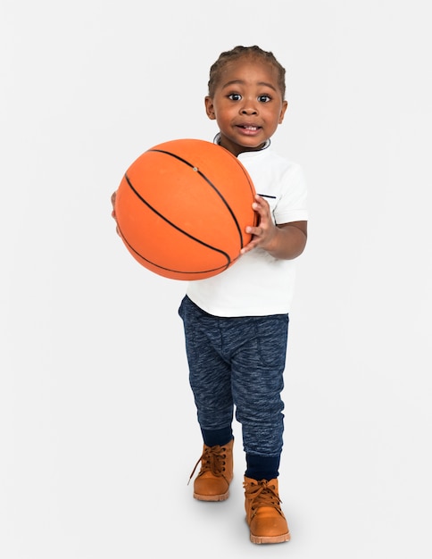 Premium Photo | Little kid with basketball concept