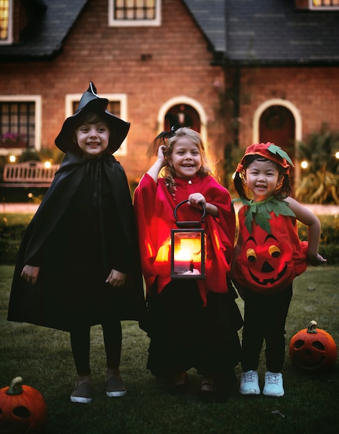 Photo little kids trick or treating