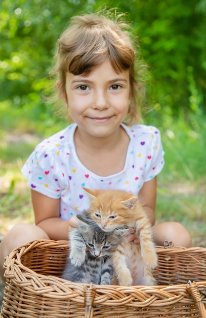 Little kittens in the hands of children