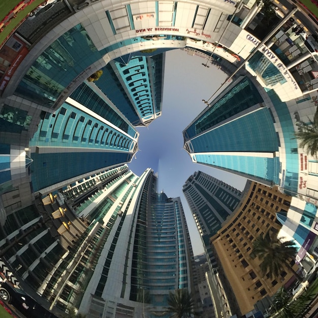 Photo little planet format effect of modern buildings in city