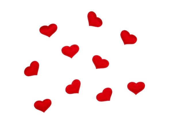 Little red hearts on a white background