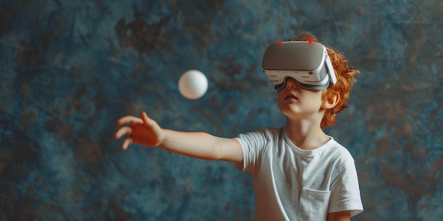 Little redhead boy dressed in a white tshirt playing pingpong with a virtual reality glasses Isolated on dark textured background