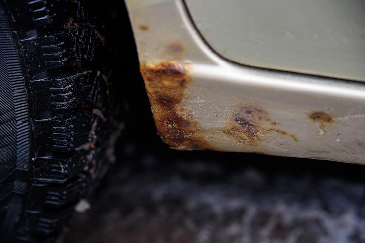 A little rust at the bottom of the car sill Paint bloat