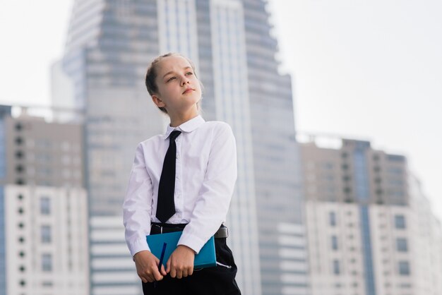 Little school girl, modern life communication