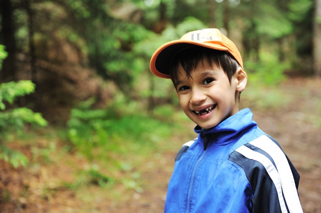 Little scouts in forest discovering nature