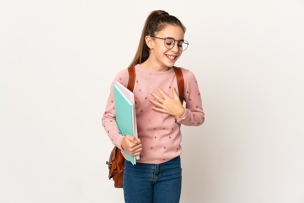 Little student girl over isolated background smiling a lot