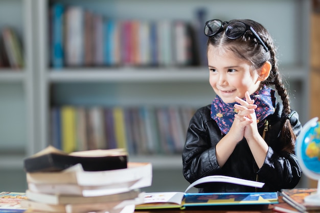 little thai girl learning with happy.