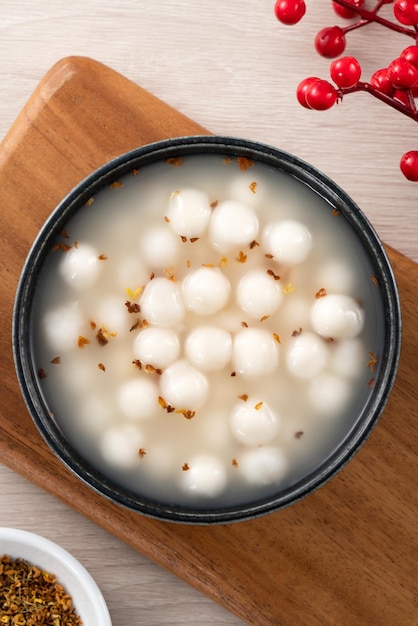 Little white tangyuan with sweet osmanthus honey and syrup soup