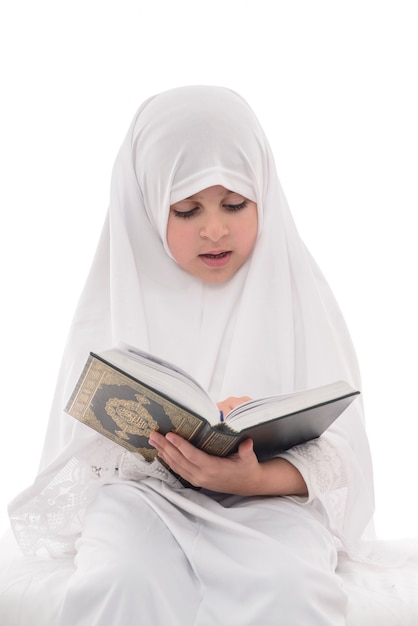 Little Young Muslim Girl Reading Quran