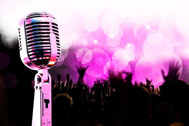 Live music background.Live music background.Vintage microphone and public