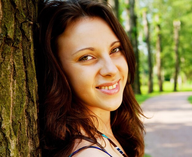 Lively portrait of beautiful model in the park