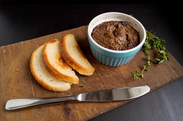 Liver pate with toast on a Board