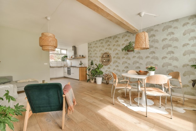 A living and dining room with a table and chairs