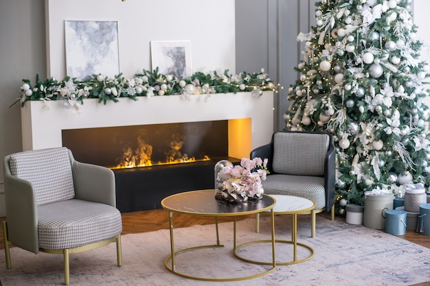 Living room interior with fireplace and chrismas tree