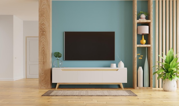 Premium Photo | Living room interior with tv and cabinet on empty blue wall  background.3d rendering