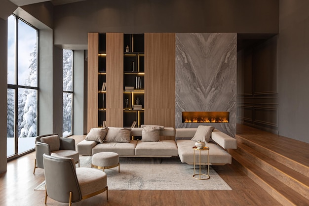 Living room marble wall fireplace and stylish bookcase in chic expensive interior of luxury country house with a modern design with wood and led light gray furniture with gold elements