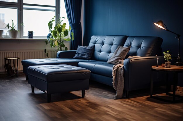 A living room with a blue couch and a fireplace