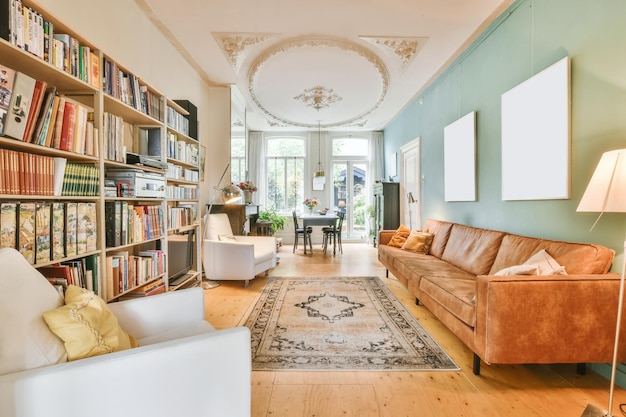 A living room with bookshelves and a couch