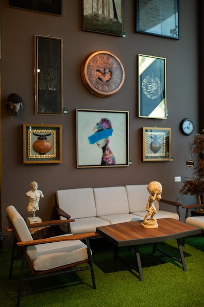 A living room with a clock and a couch and a couch.