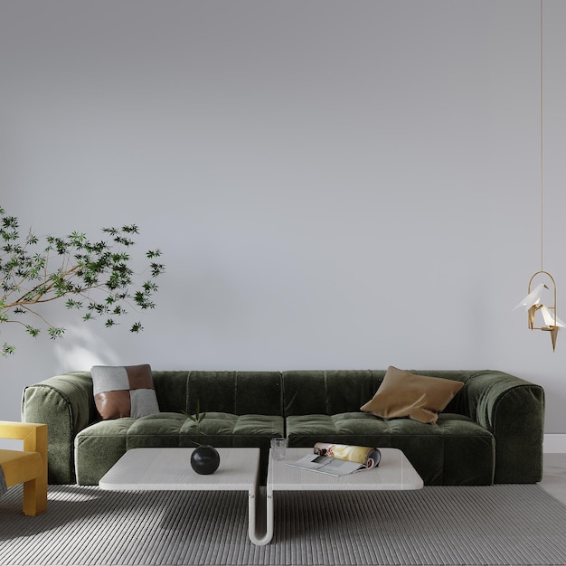 A living room with a green couch and a white table with a plant on it.