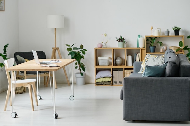 Living room with sofa and workplace