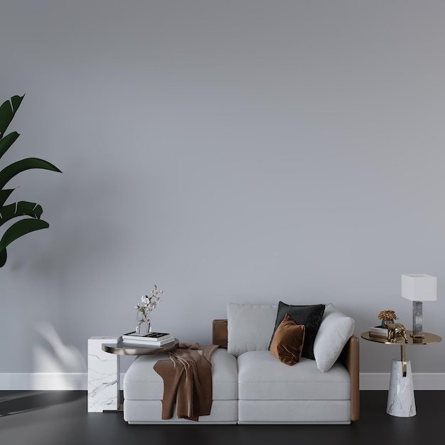 A living room with a white couch and a plant on the wall