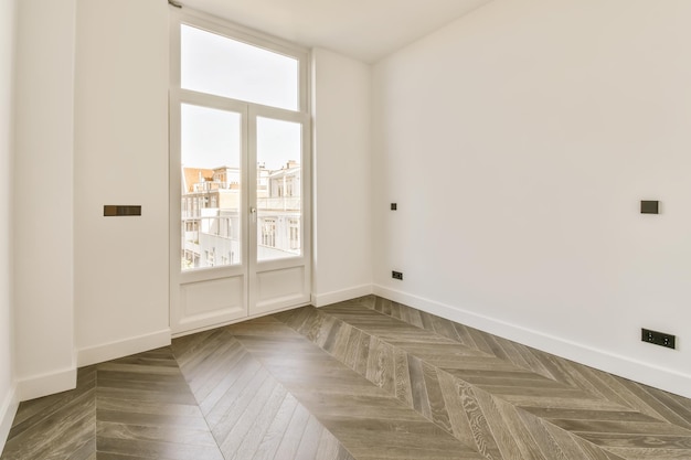 Photo a living room with wood floors and a window