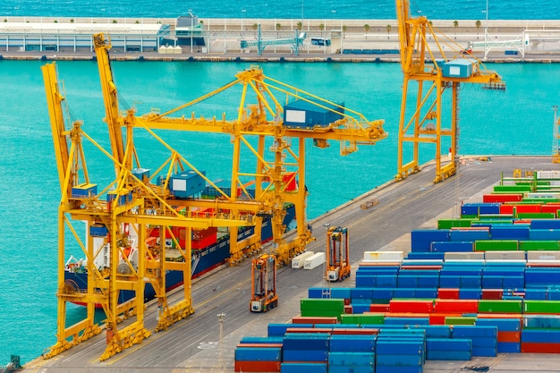 Loading containers on a sea cargo ship, Barcelona