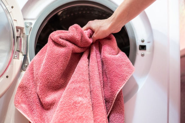 Loading laundry into the washing machine