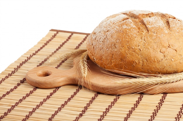 A loaf of bread on a board