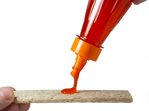 A loaf of bread is poured with a spicy sauce Seasoning for food