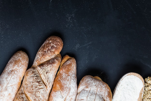 Loaf of bread placed on a dark background