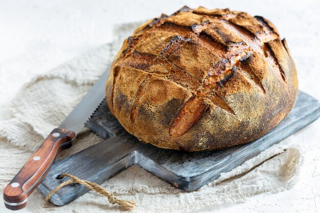 Loaf of bread on sourdough from wheat and rye flour