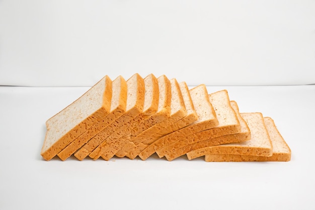 Photo loaf of bread on white background