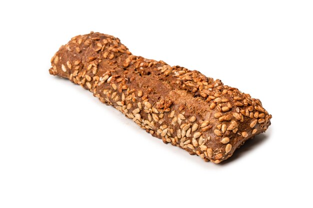 Loaf of bread with sunflower seeds isolated on a white background