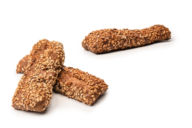 Loaf of bread with sunflower seeds isolated on a white background