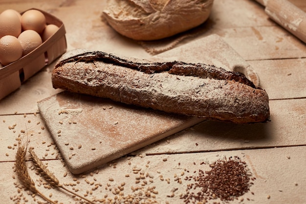 Loaf of bread on wooden background food closeup Bread at leaven Unleavened bread