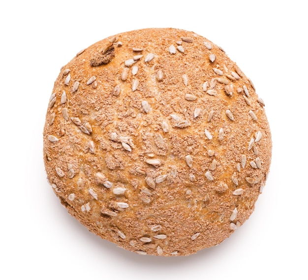 Loaf of healthy gluten free bread with sunflower seeds, isolated on white, top view