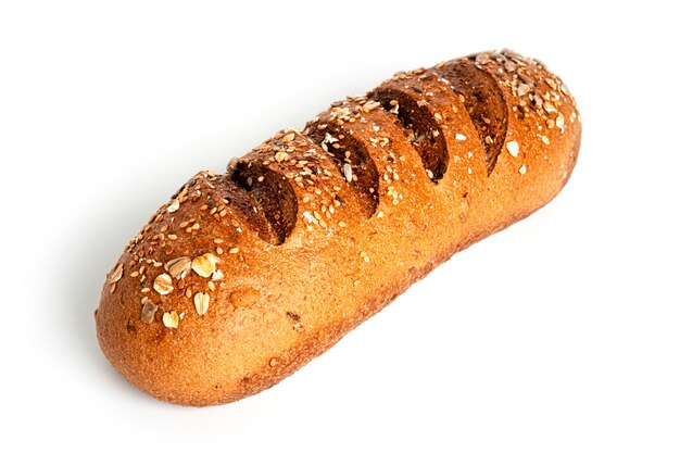 A loaf of rye flour with bran isolated on a white background. High quality photo