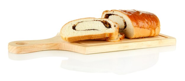 Loaf with poppy seeds on cutting board isolated 
